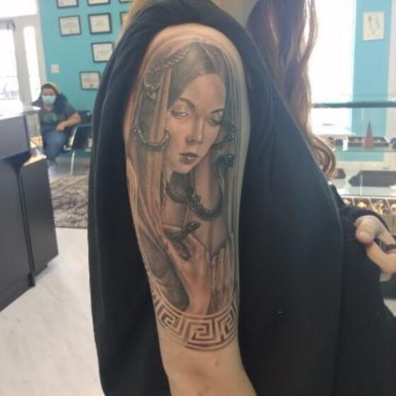 Tattoo by Travis